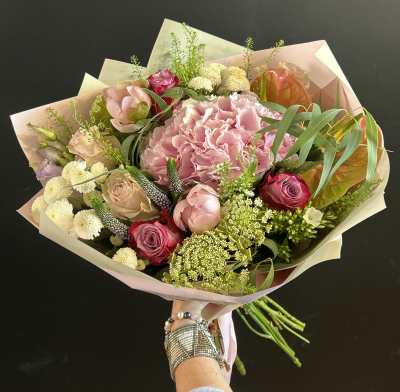 Blush Luxe - A luxurious bespoke hand-tied bouquet in soft blush pink, ivory and fresh green tones, beautifully arranged with seasonal flowers and elegant foliage.